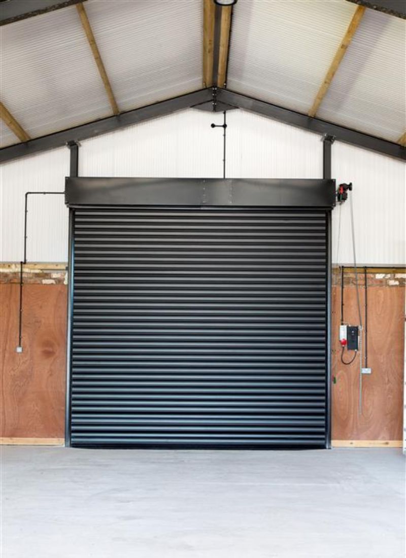 Secure roller shutter installed on shopfront exterior in Scotland