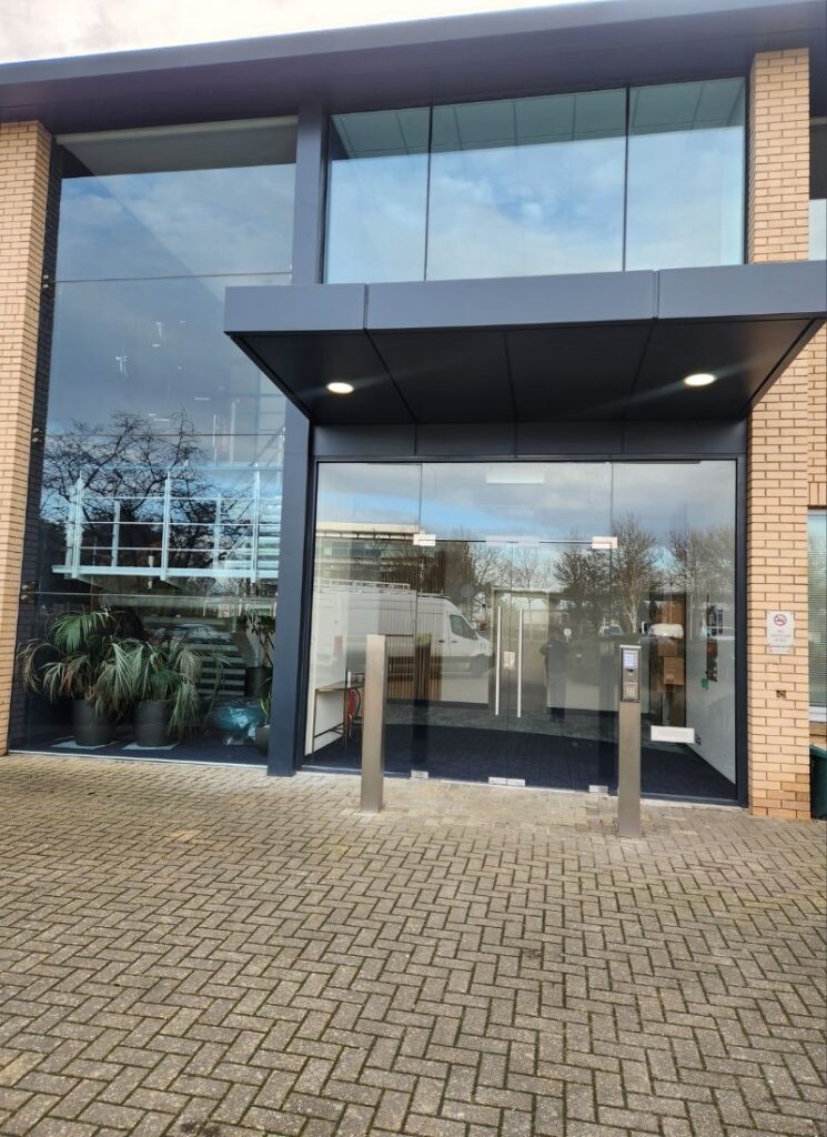 Clear glass storefront fitted for commercial retail building in Scotland